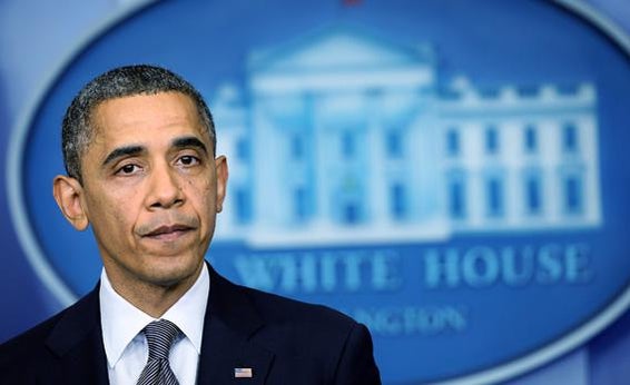 President Obama pauses as he makes a statement in response to the elementary school shooting in Connecticut.